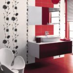 red-white design of the bathroom combined with the toilet