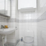 White tiled bathroom