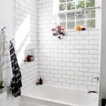 White bathroom with shallow honeycomb floor