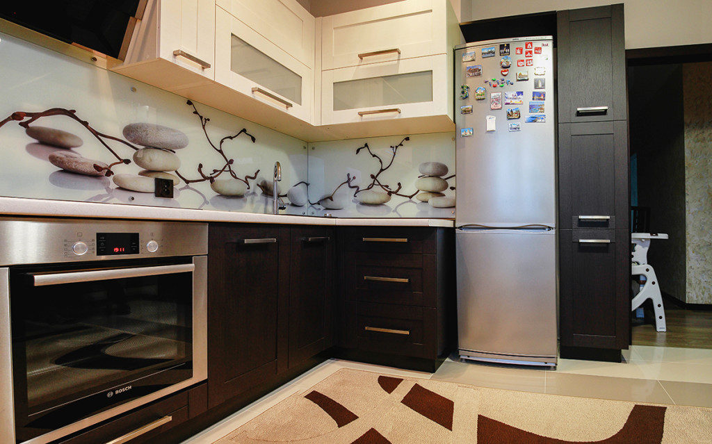 Beige kitchen in brown surroundings.