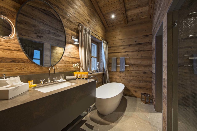 Bathroom design in a wooden house style chalet