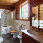 Design of a bathroom in a wooden log house