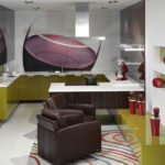 Wall mural kitchen interior with red accent