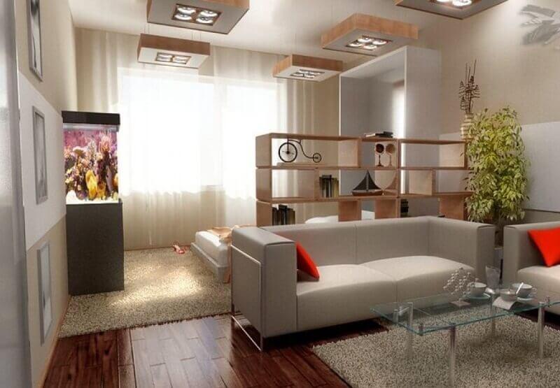 dzīvojamās istabas dizains sadalīts 2 zonās