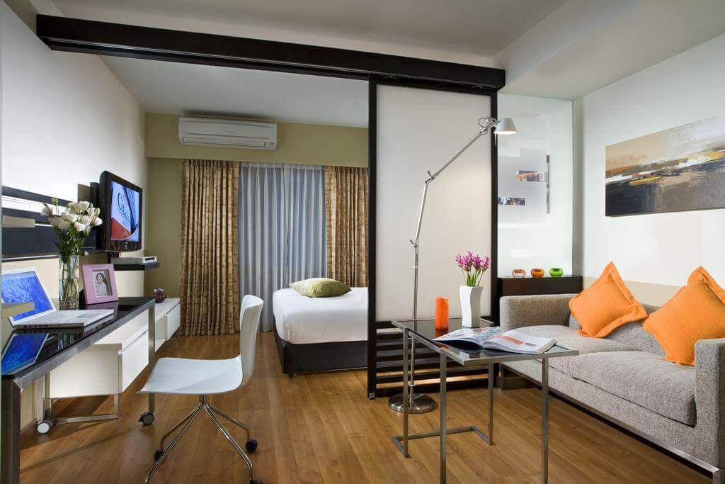 bir odada oturma odası ile yatak odası tasarımı