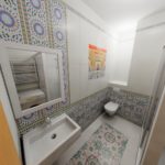 העיצוב של חדר האמבטיה בחרושצ'וב הוא לבן ואריחים עם קישוטים