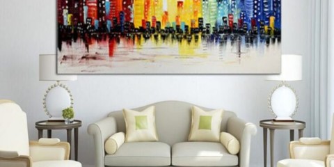 The paintings in the living room interior are contrasting bright colors.