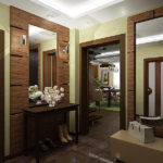 Décorer le hall d'entrée avec des miroirs et des olives en stuc