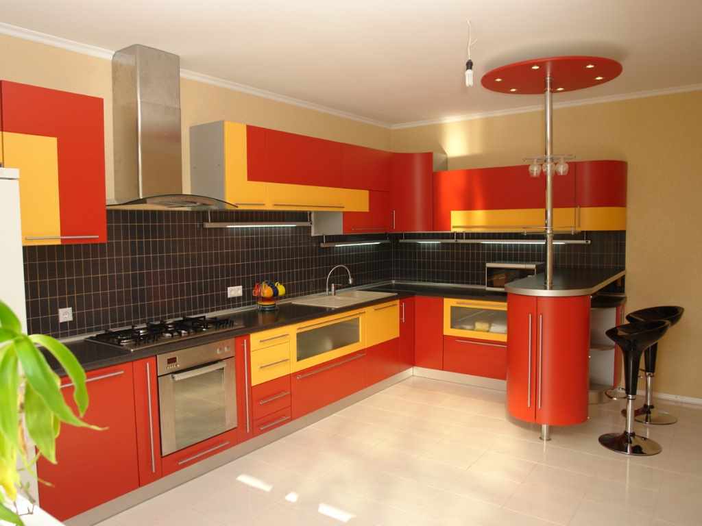 version of the bright interior of the red kitchen