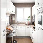 An example of a beautiful design of a corner kitchen photo