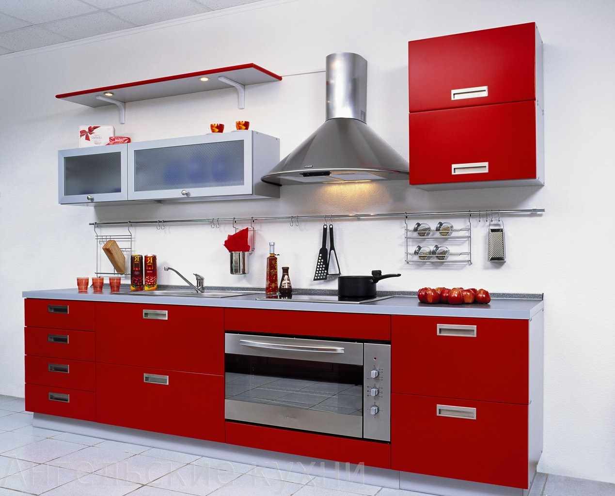 an example of an unusual design of a red kitchen
