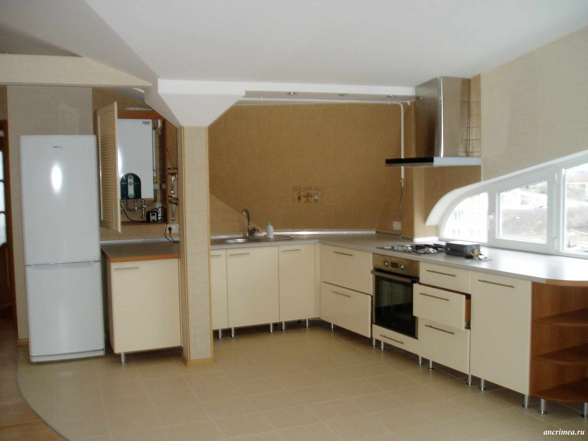 An example of a light style kitchen with a gas boiler
