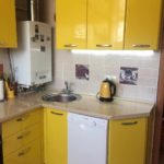 An example of a bright style kitchen with a gas boiler picture