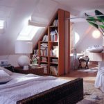 הרעיון של עיצוב חדר שינה יוצא דופן בתצלום עליית הגג