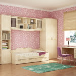 Pink wallpaper in a stylish girl's room