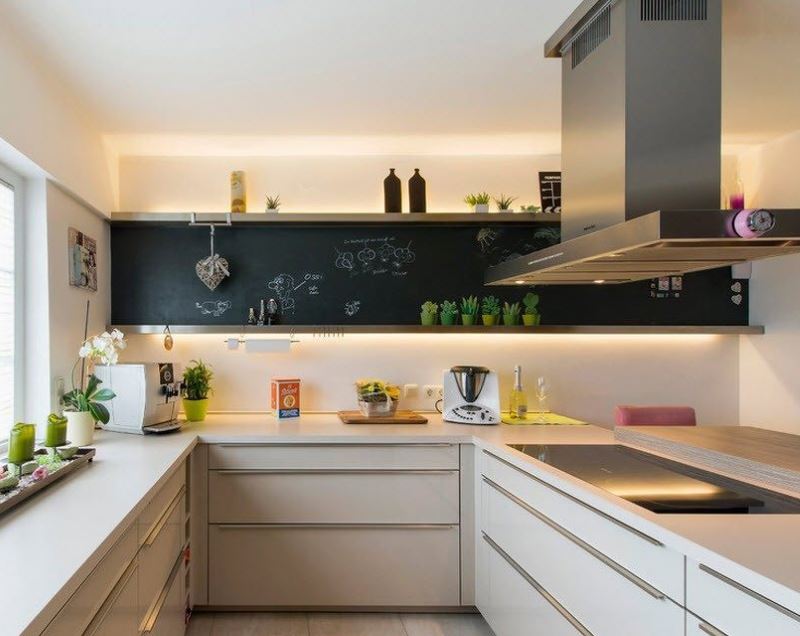 LED lighting of the upper cabinets in the design of the kitchen