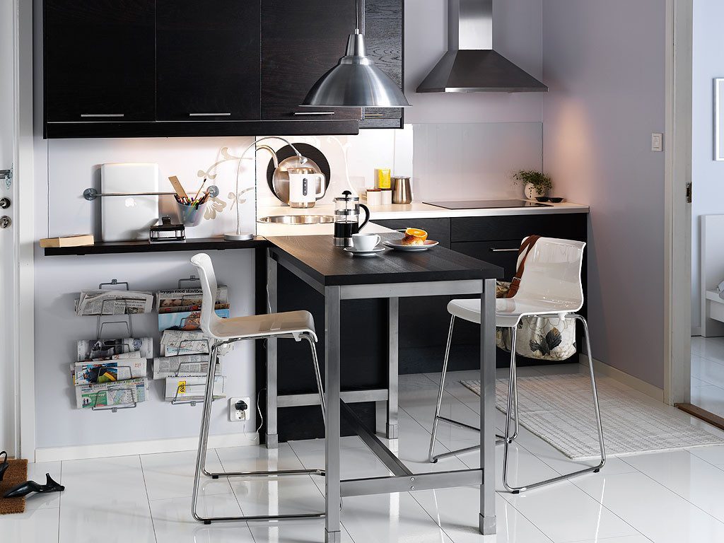 Black furniture in the interior of the kitchen