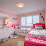 Pink furniture in teenage girls room