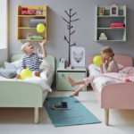 Minimalist room design for two children.