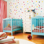 Blue cots for babies of the same age