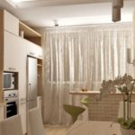 Kitchen design with a balcony in soft colors