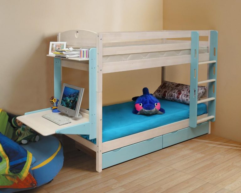 Children's bed in two tiers with a folding table