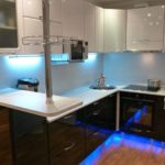 Neon lighting kitchen unit with a breakfast bar