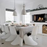Fashionable chairs at the dining table