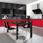 Black dining table in a bright kitchen