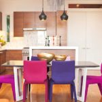 Colorful chairs in the dining area