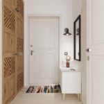 Armoire à portes en bois dans un couloir blanc