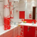The combination of red and white colors in the design of the bathroom
