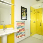 Bright bathroom interior with a picture on the wall