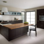 Wenge kitchen with island and fitted with built-in appliances