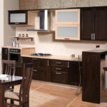 Original kitchen in a combination of wenge color and light shades of wood