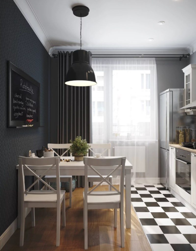 Masă luminoasă luminoasă în fața unui perete negru într-o bucătărie cu 8 pătrate