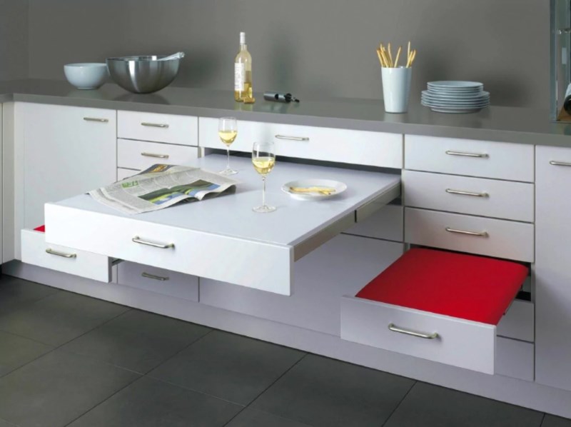 Retractable furniture in the design of a small kitchen