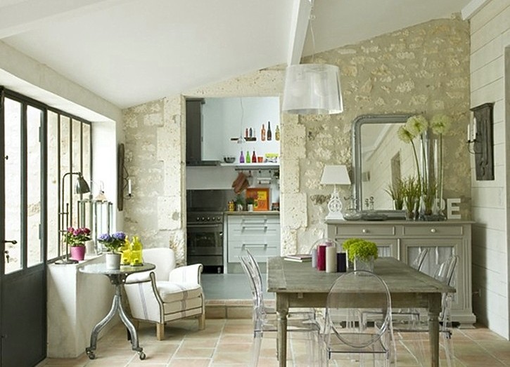 The interior of a small studio apartment in the style of Provence