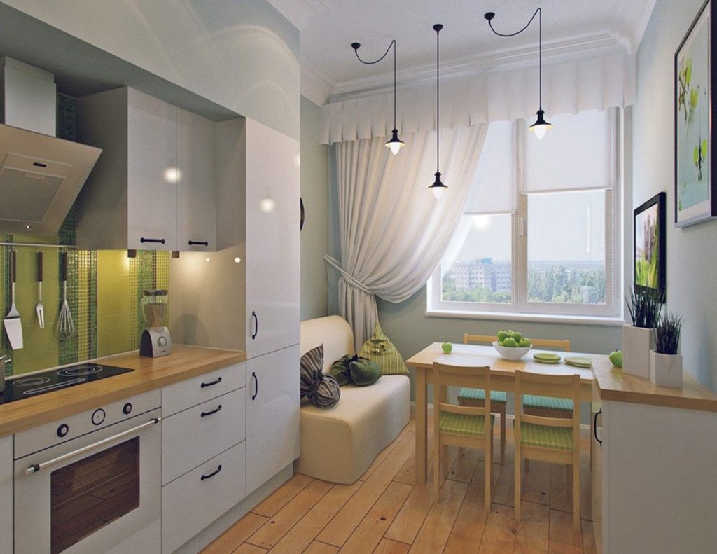 Küçük bir dairede kompakt bir mutfak-yemek odası tasarlayın