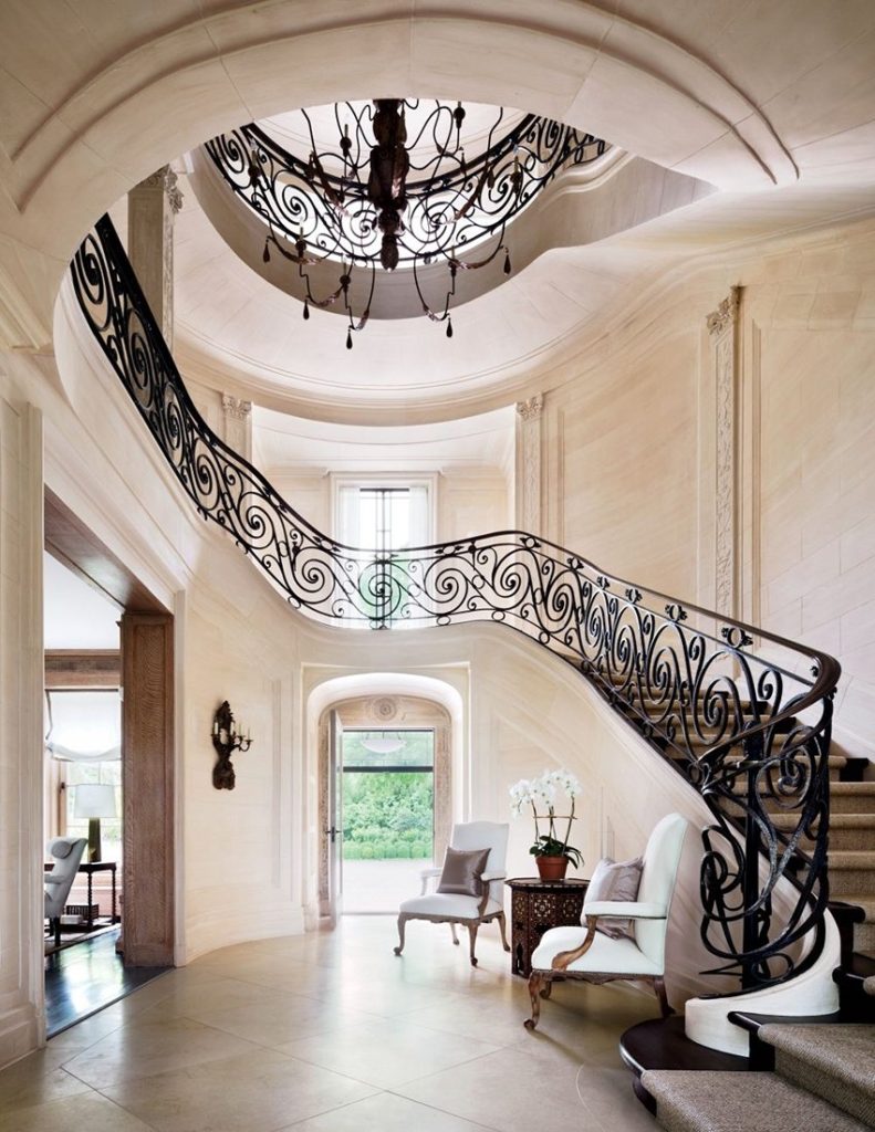 Design a hallway with a high ceiling in a country house