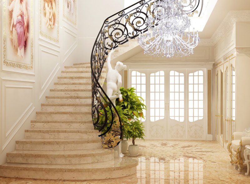 Staircase with wrought iron railing in the lobby of a private house