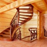 Spiral staircase in a wooden house