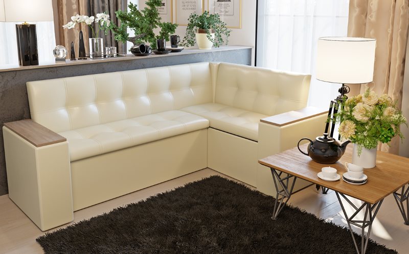 Canapé d'angle beige avec couchette