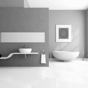 Conception de salle de bain en gris et blanc.
