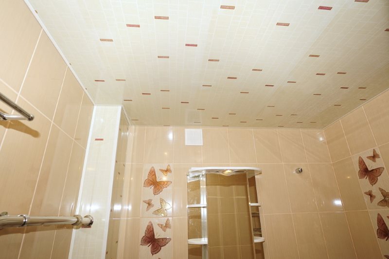 Bathroom wall cladding with beige PVC panels