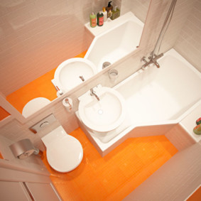 Plancher orange dans une petite salle de bain