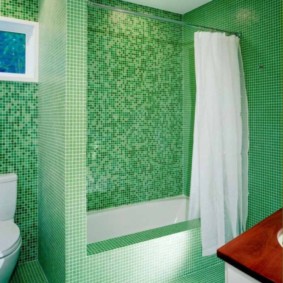 White curtain in a green bathroom