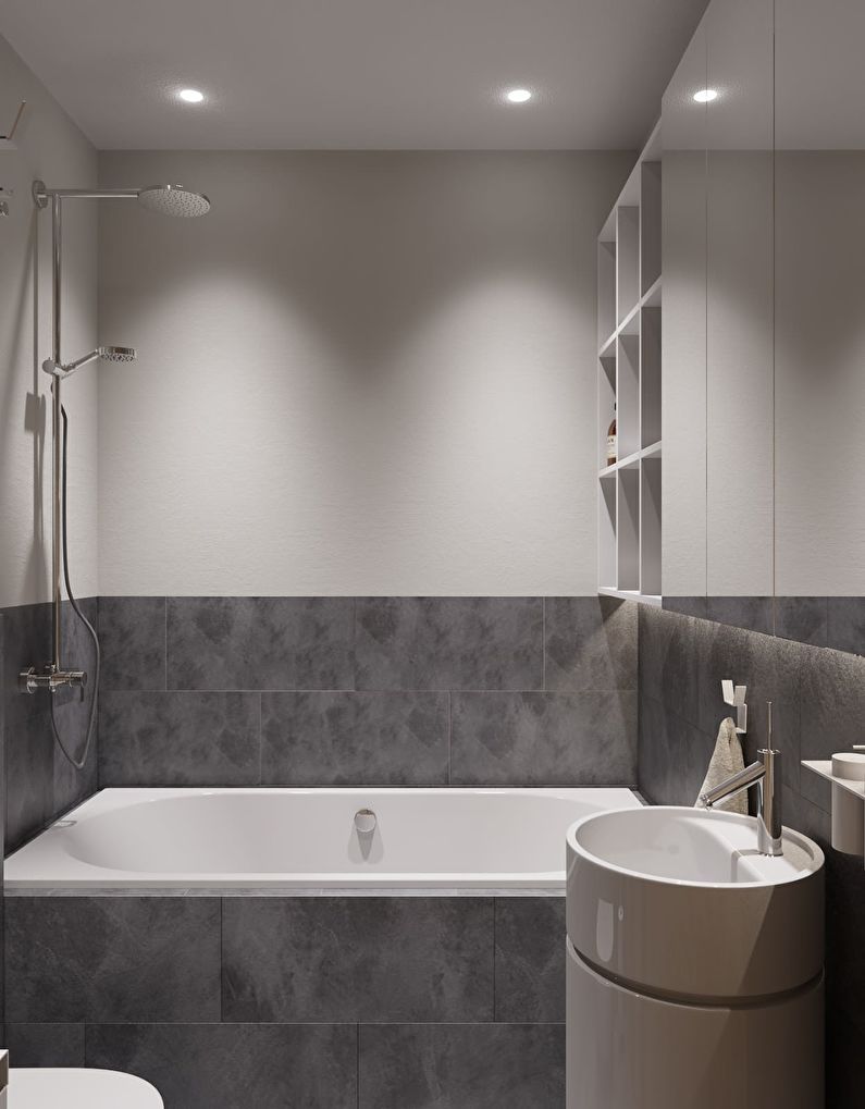 Carrelage gris minimaliste sur le mur de la salle de bain