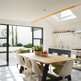 Kitchen-dining room with skylights