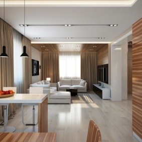 Design of a modern kitchen-living room in a private house